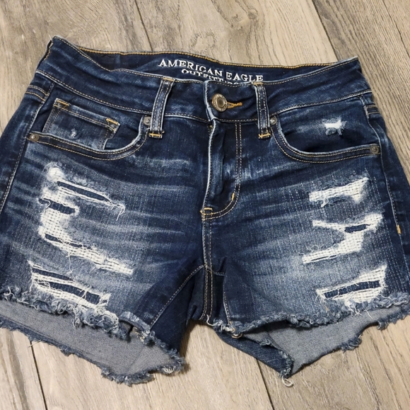 American Eagle Outfitters Pants - American Eagle | Distressed Shorts | Size 4 | Medium Wash